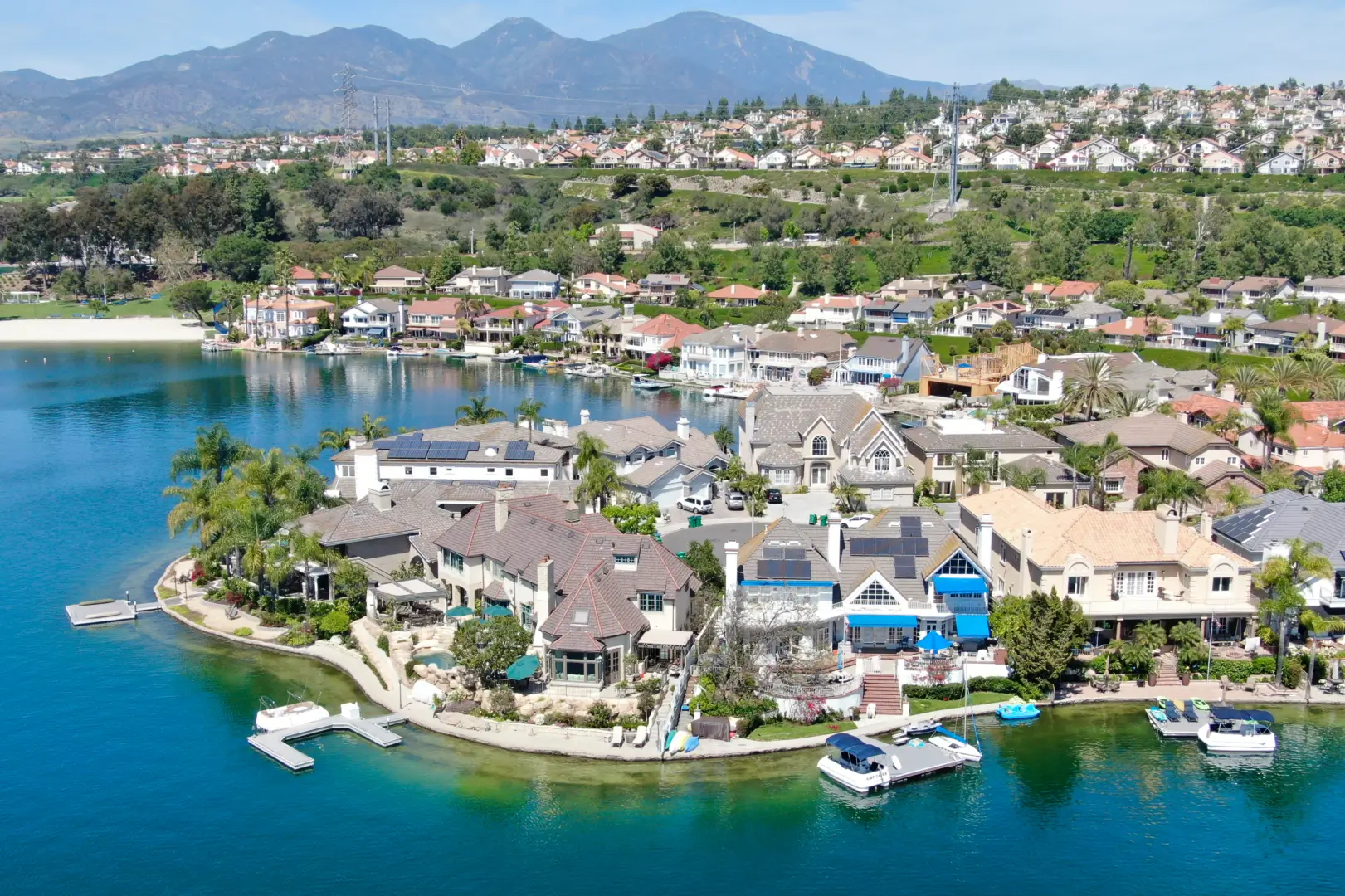 Aerial view of waterfront mansions and docks
